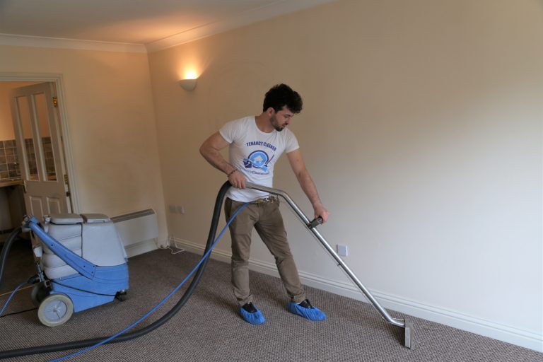 Carpet Cleaning in West Yorkshire — Tenancy Cleaner technician steam cleaning a carpet